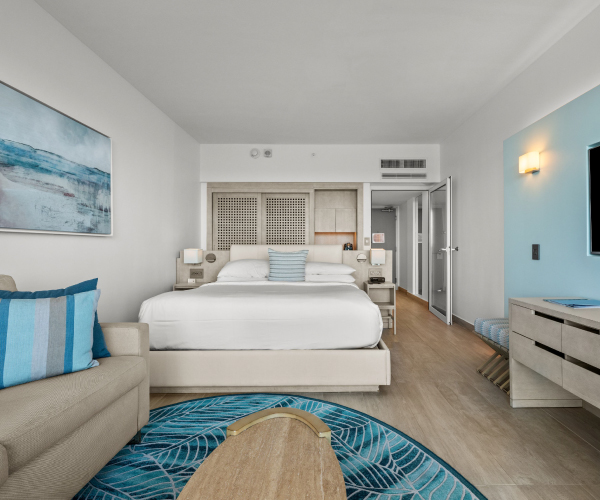 La Concha Resort Ocean Tower Guest room with a king bed, a balcony