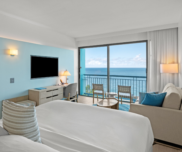 La Concha Resort Ocean Tower Guest room with a king bed, a balcony, and an ocean view
