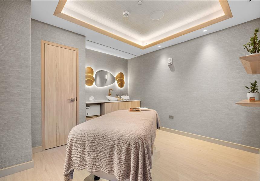 A massage table in a room
