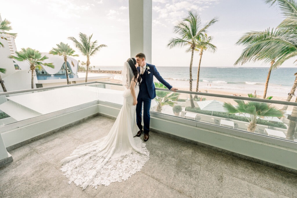 A bride and groom kissing