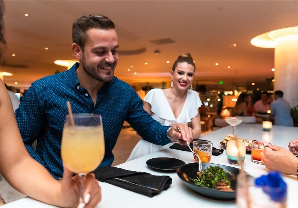 People sitting around a table eating
