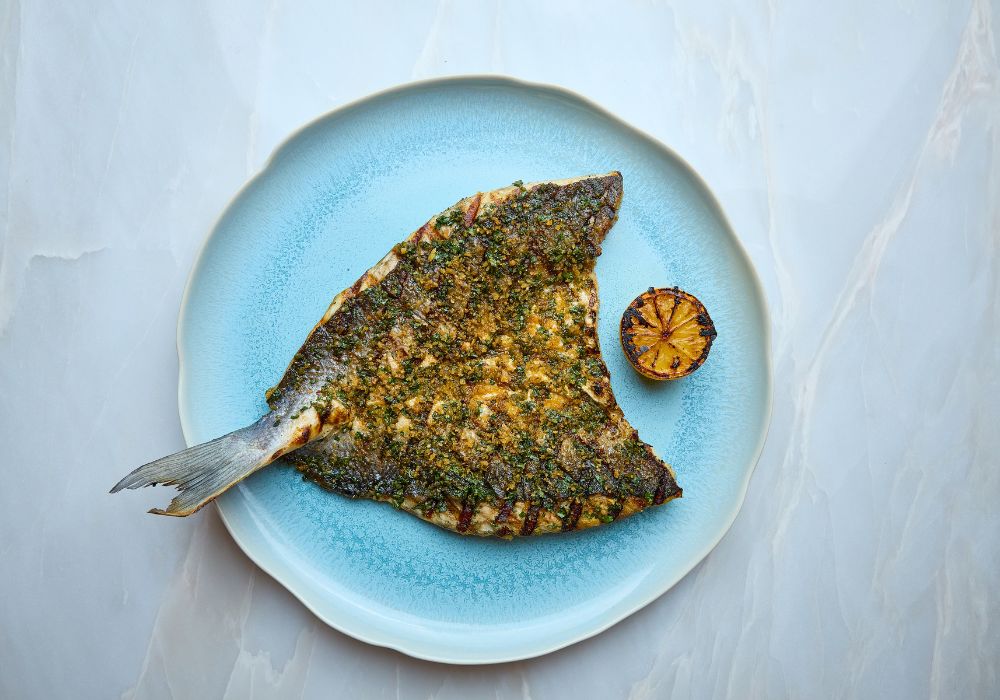 Fish on blue plate