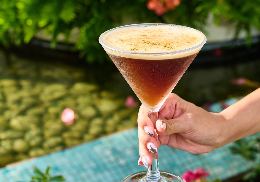 espresso martini drink in hand at solera