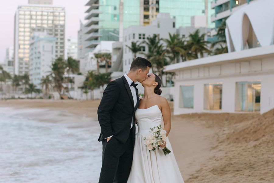 Wedding couple at the beach in front of the La Concha Shell