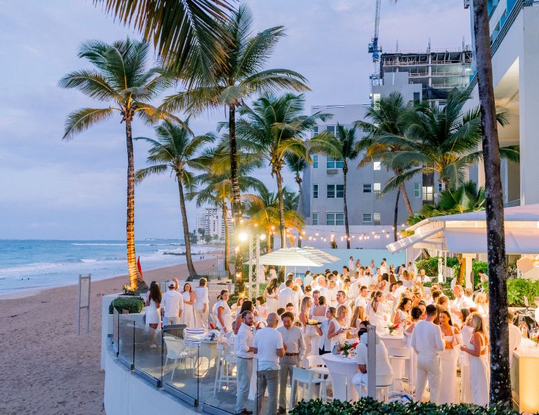 An outdoor venue with tables and chairs