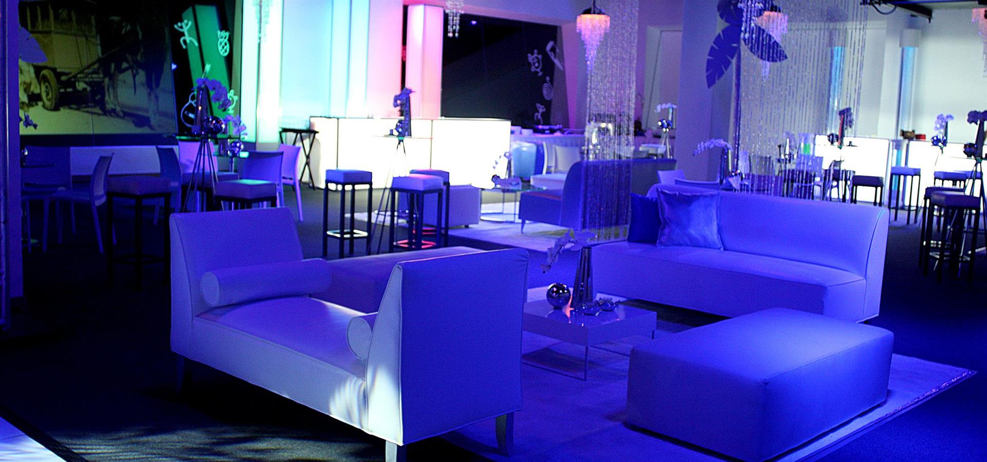 A picture of a seating area with blue lights