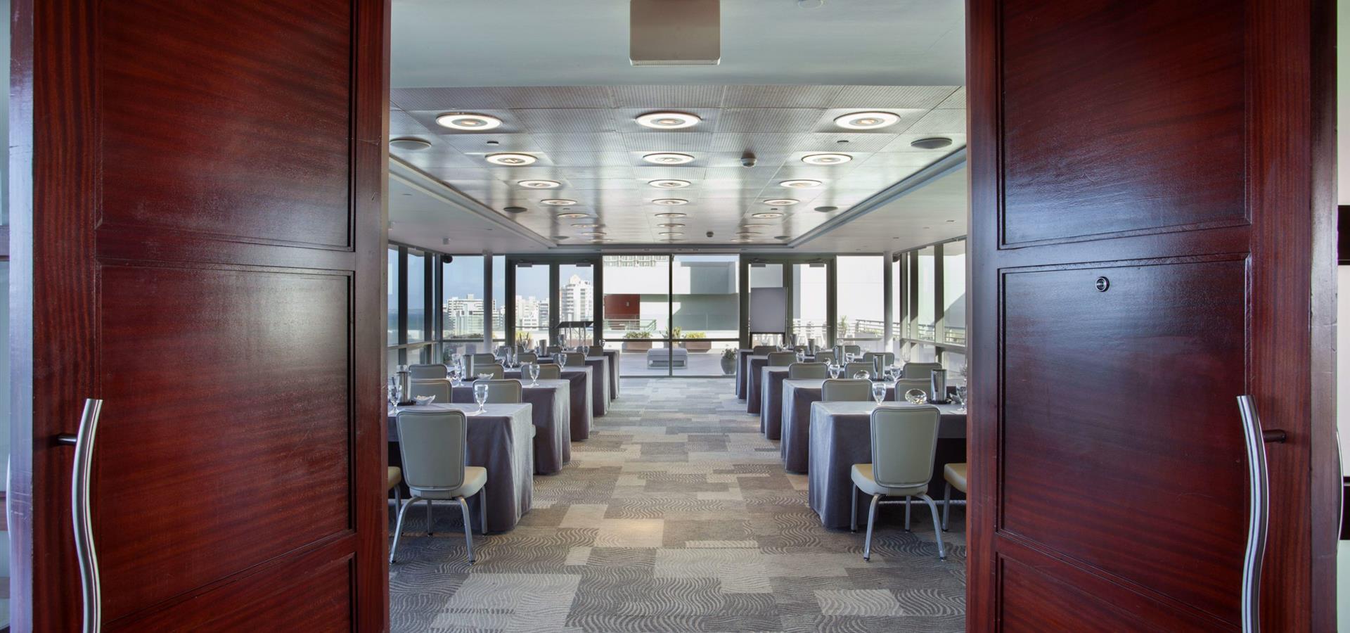 Doors opening, leading into a room