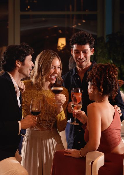 Couple with drinks in Lobby Bar