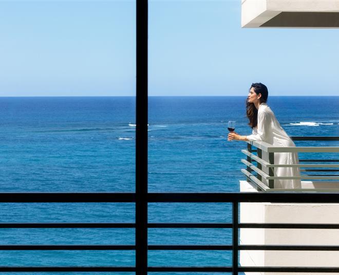 Woman looking out to the ocean 