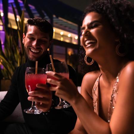 People laughing and drinking