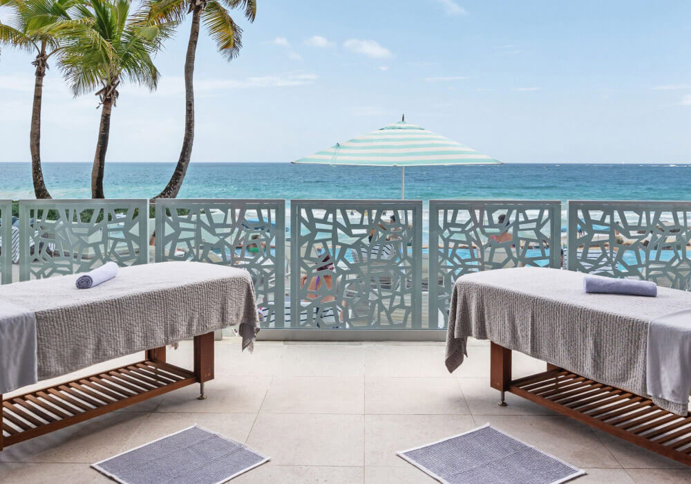 Oceanside view spa treatment area with personal towels