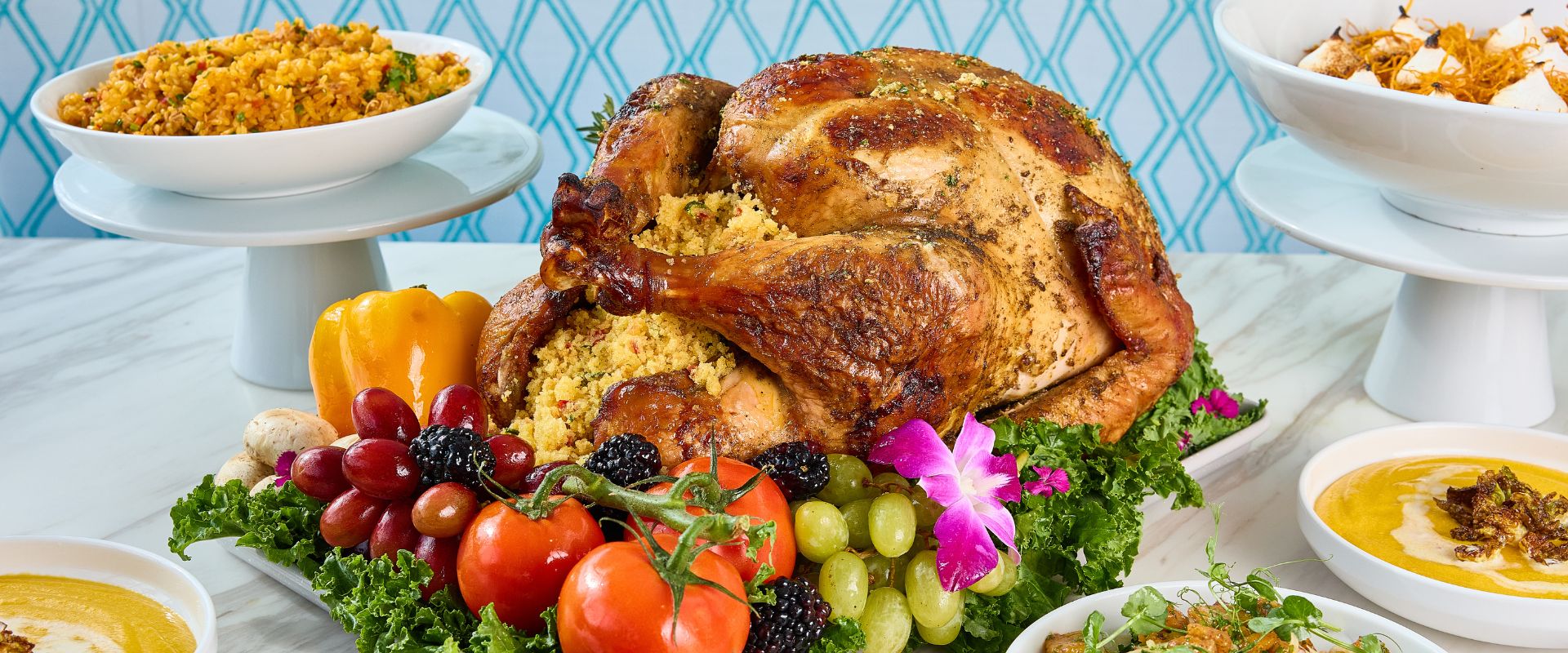 table with thanksgiving turkey and other dishes