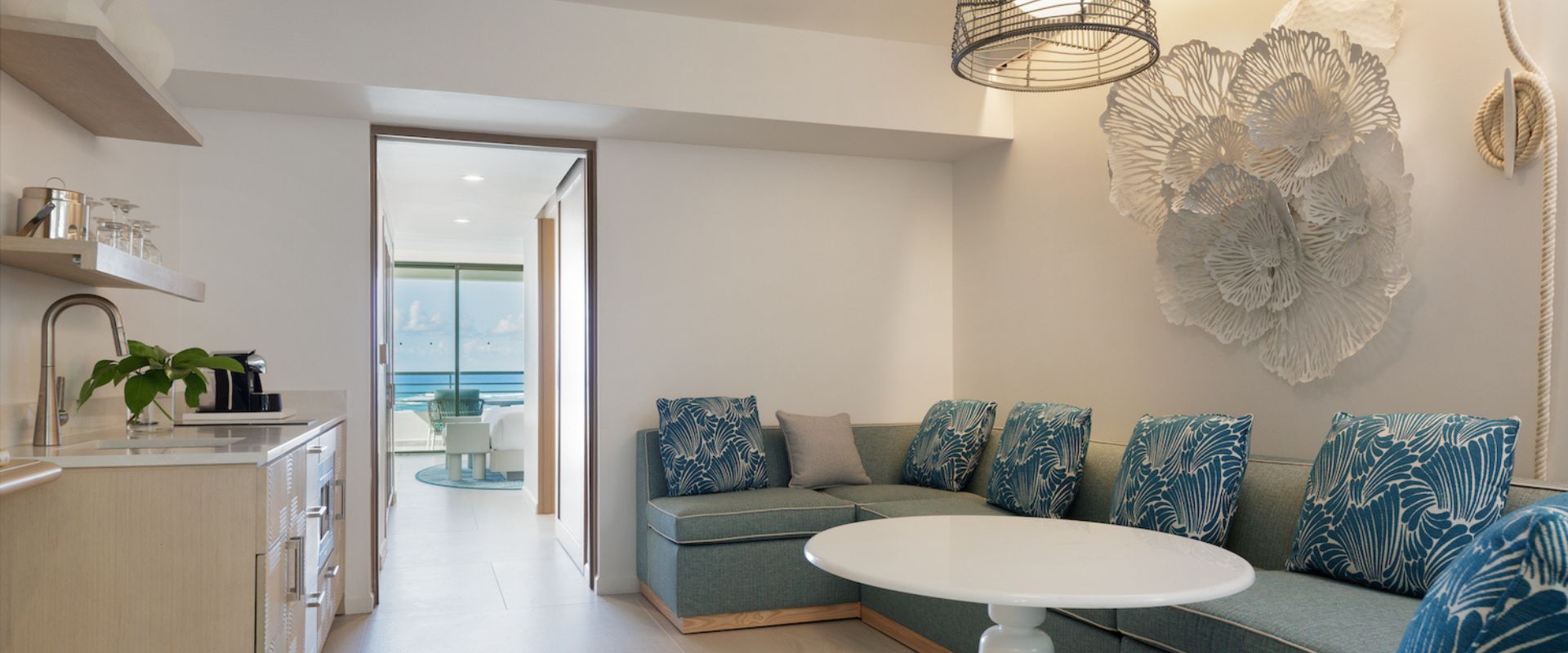 renovated suite at la concha resort sofa, kitchen and ocean view