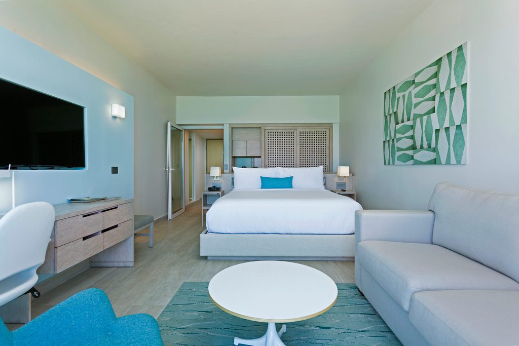 king bed in oceanfront guest room